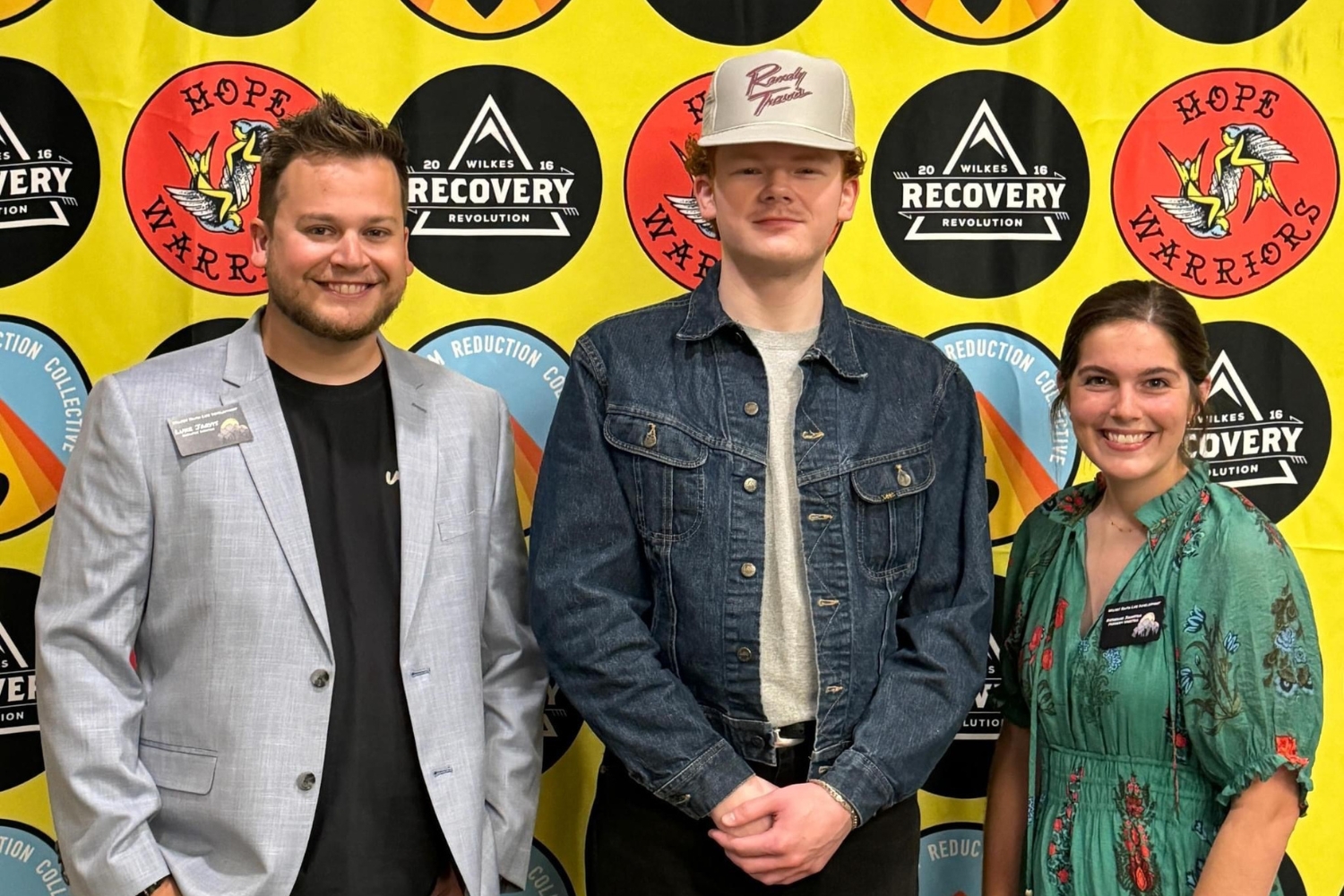 A delivery van branded with "Fruits & Veggies" parked near a field of sunflowers, under a bright blue sky with fluffy clouds